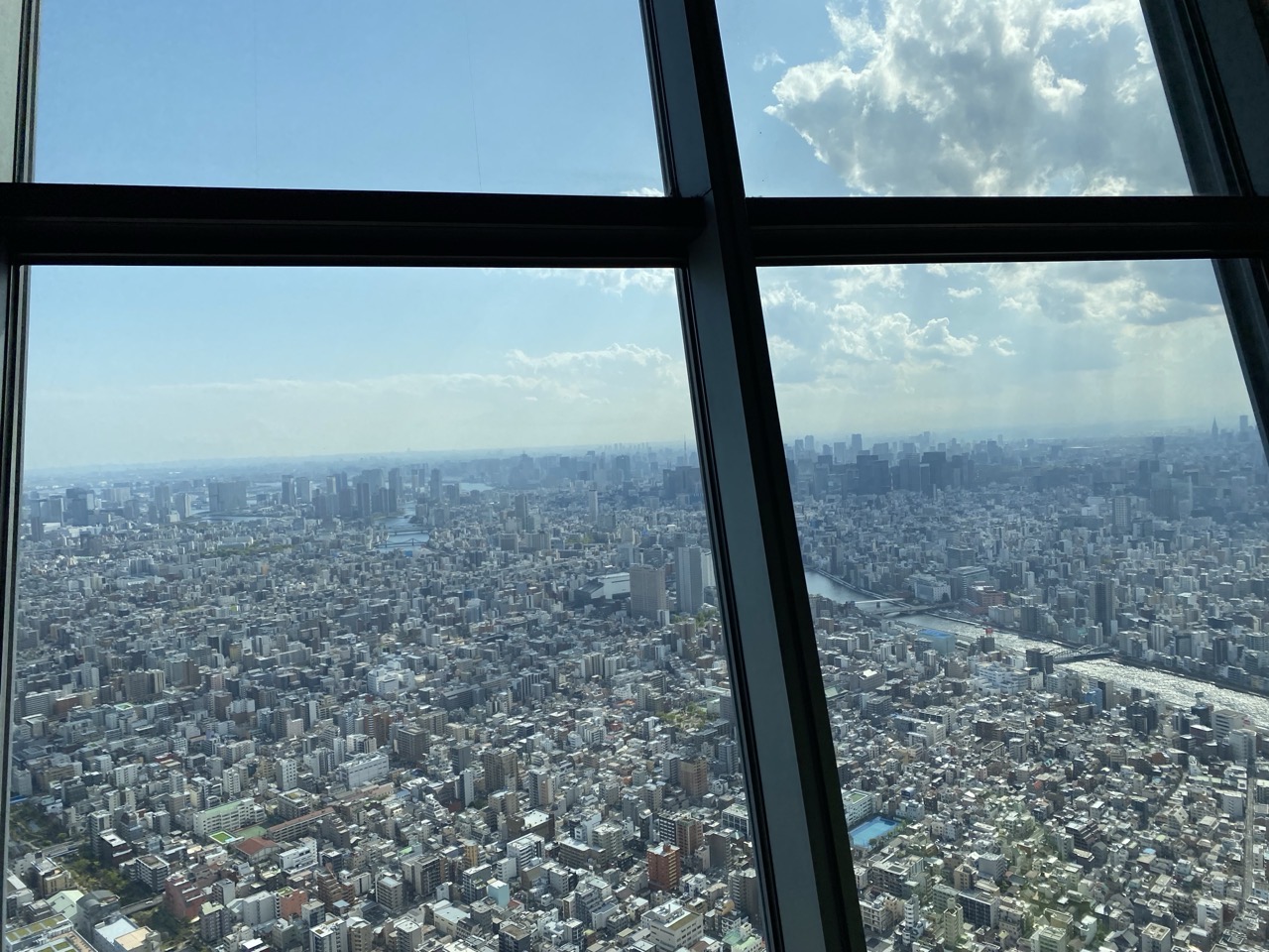 A view of Tokyo out the window of the sky tree. You can see a long way