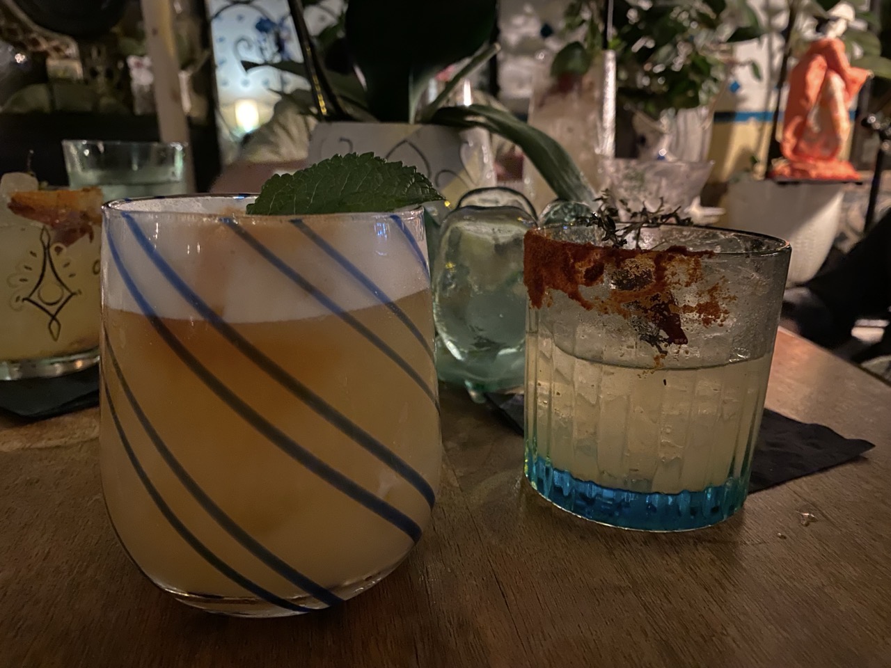 Cocktails in fun glasses. Mine is a whiskey sour on the left. Flo’s is a picante. Happy birthday Flo!