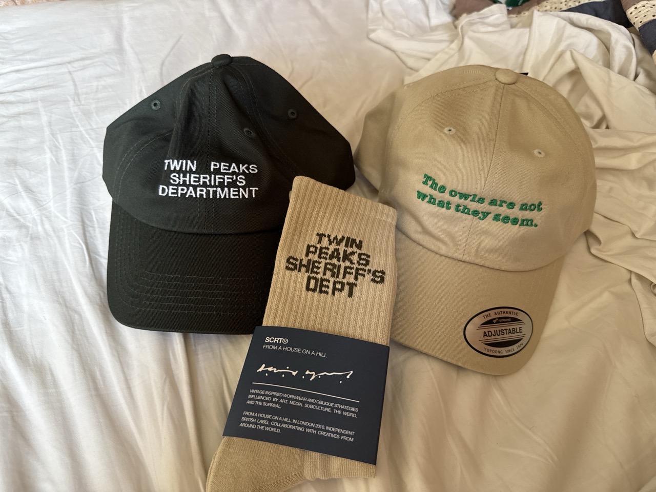 Two twin peaks hats and some twin peaks socks