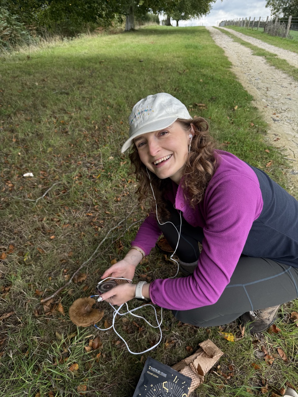 Lucy listening to mushroom music with the Pocket SCION