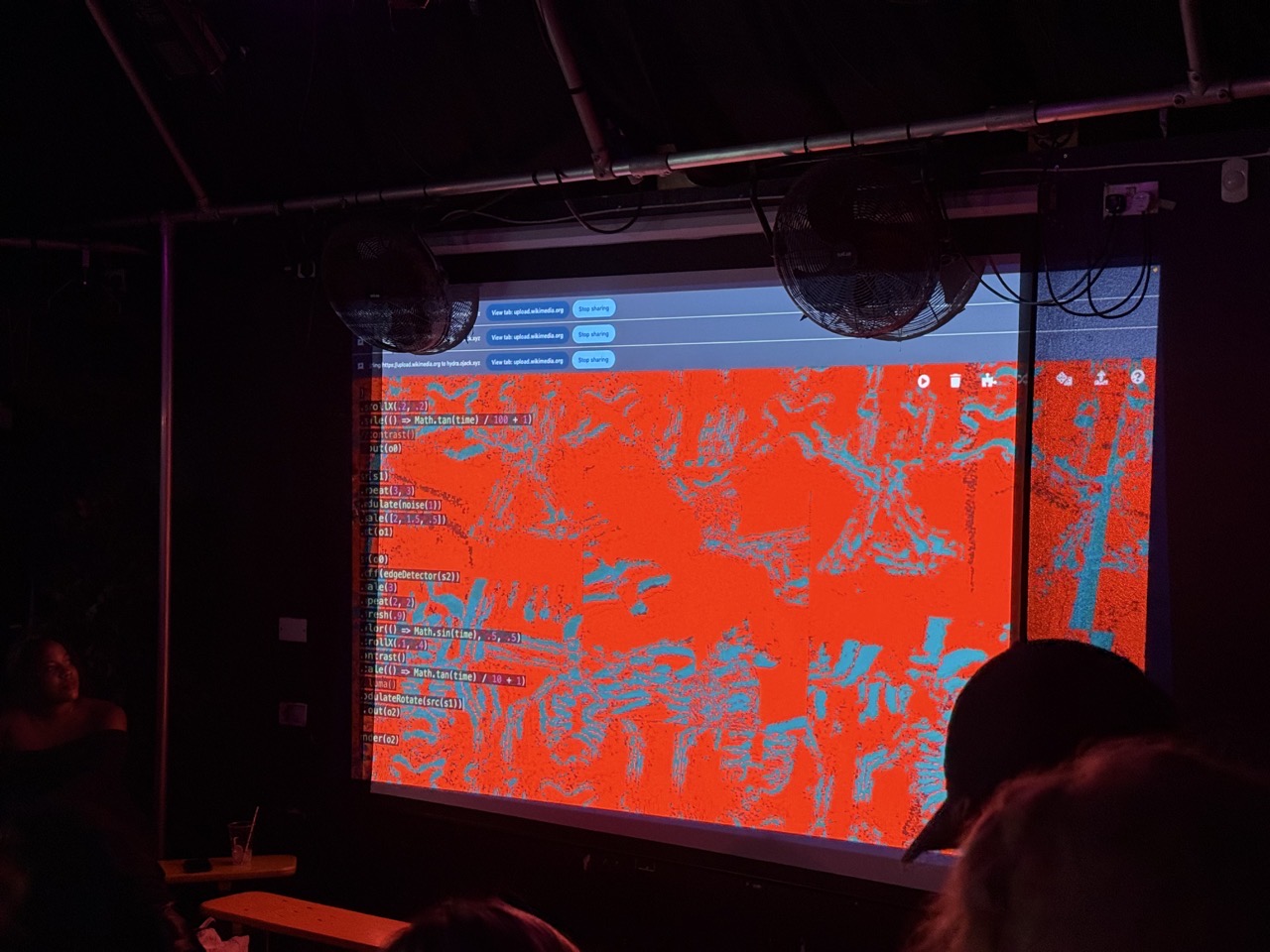 Some cool visuals on the projector screen, lots of red and skellingtons