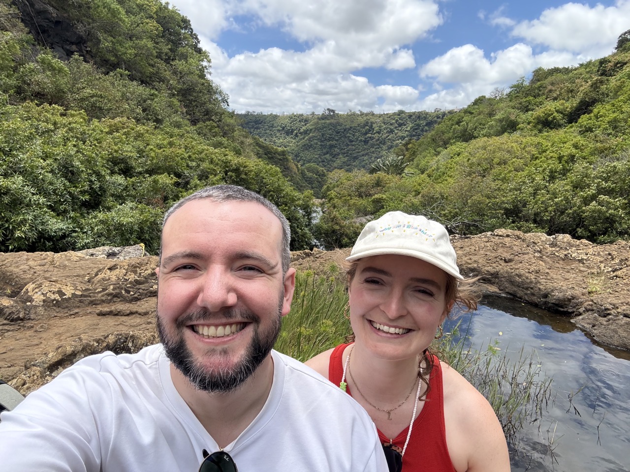 Me and Lucy grinning at the Seven Cascades