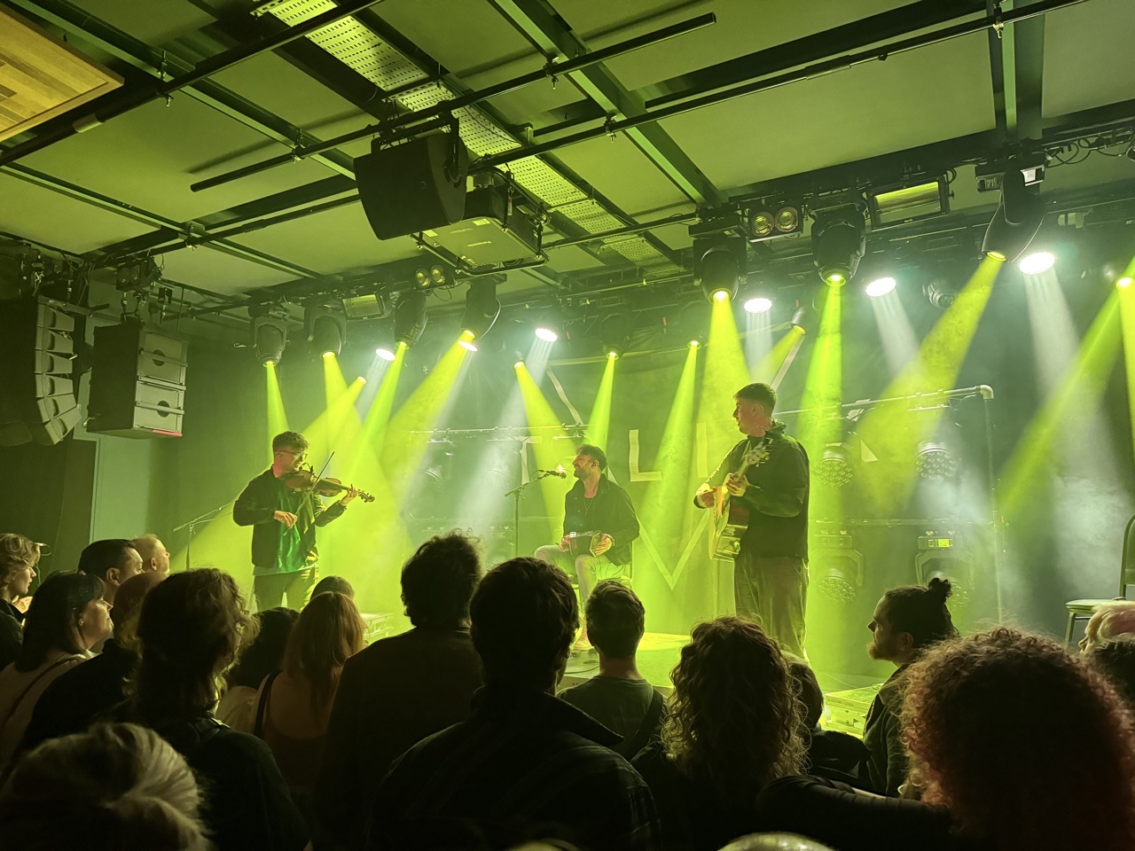 Talisk on stage at metronome with green lighting