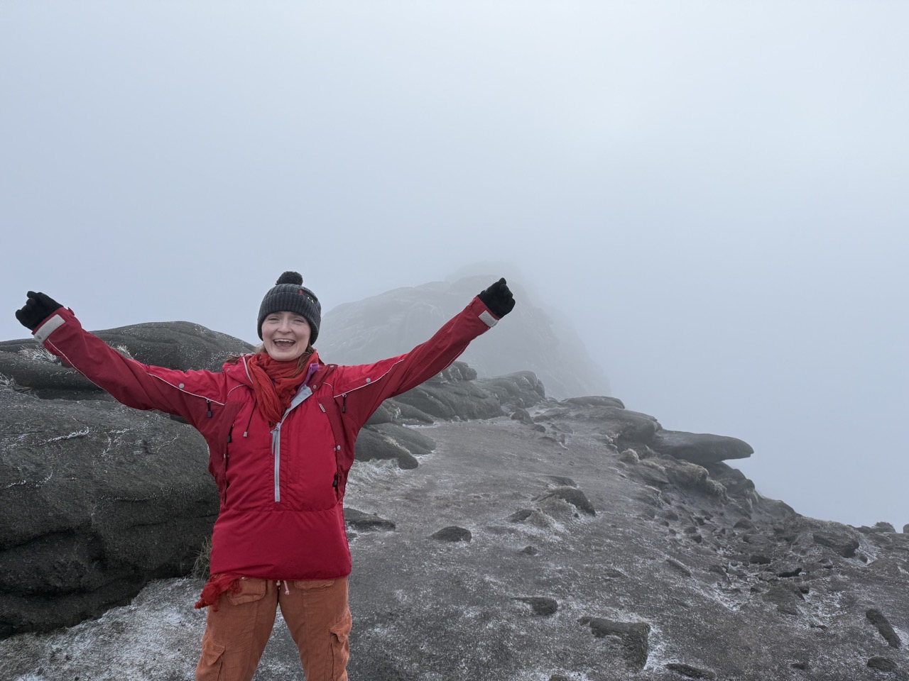 Lucy looking justifiably proud to have got to the top