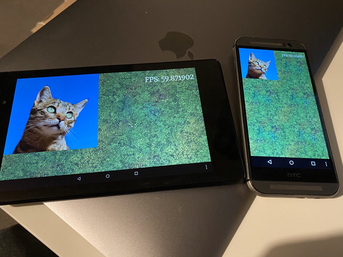 A Nexus 7 and HTC One M8 running Growl